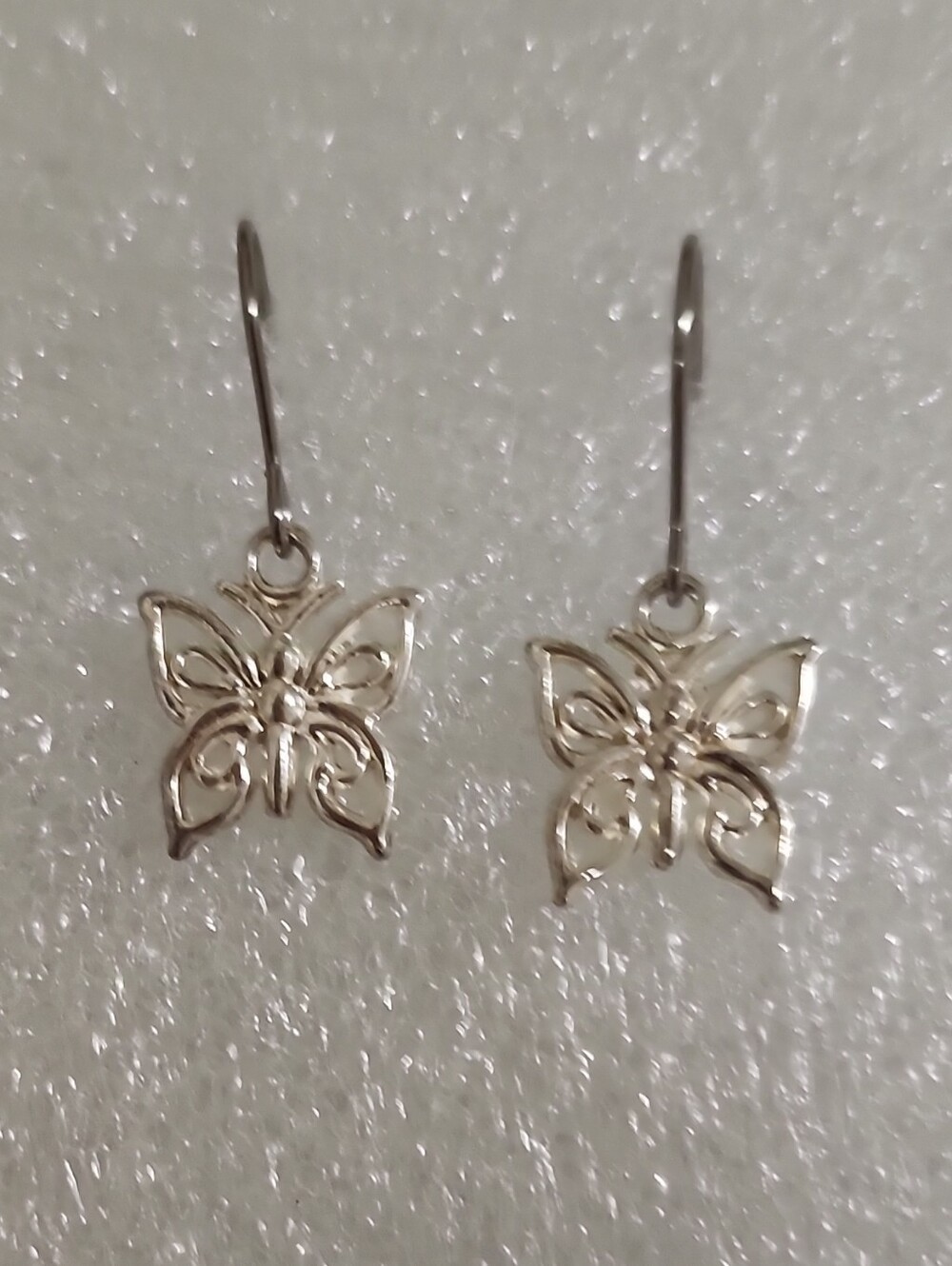 Delicate Butterfly Drop Earrings in Silver
